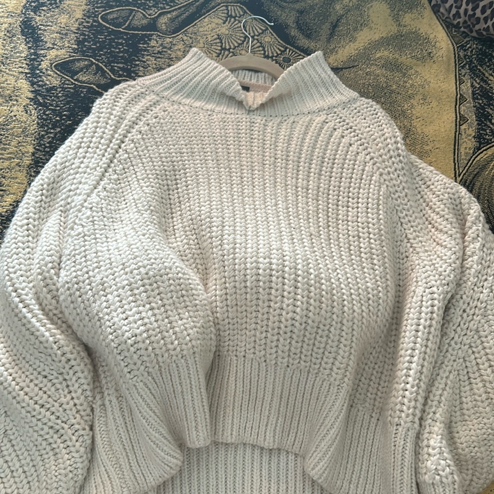 White knitted sweater
